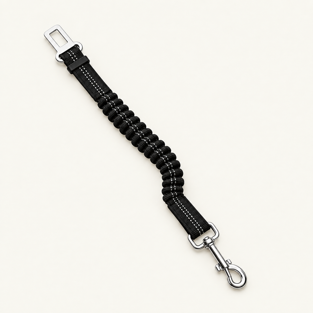 a single black tether laid out in a relaxed S curve showing its full length, snap hook at one end and buckle tongue at the other
