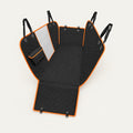 Black diamond-quilted convertible dog car seat cover with orange piping, laid open to show the grey mesh window, zipped storage pocket, side flaps and headrest straps