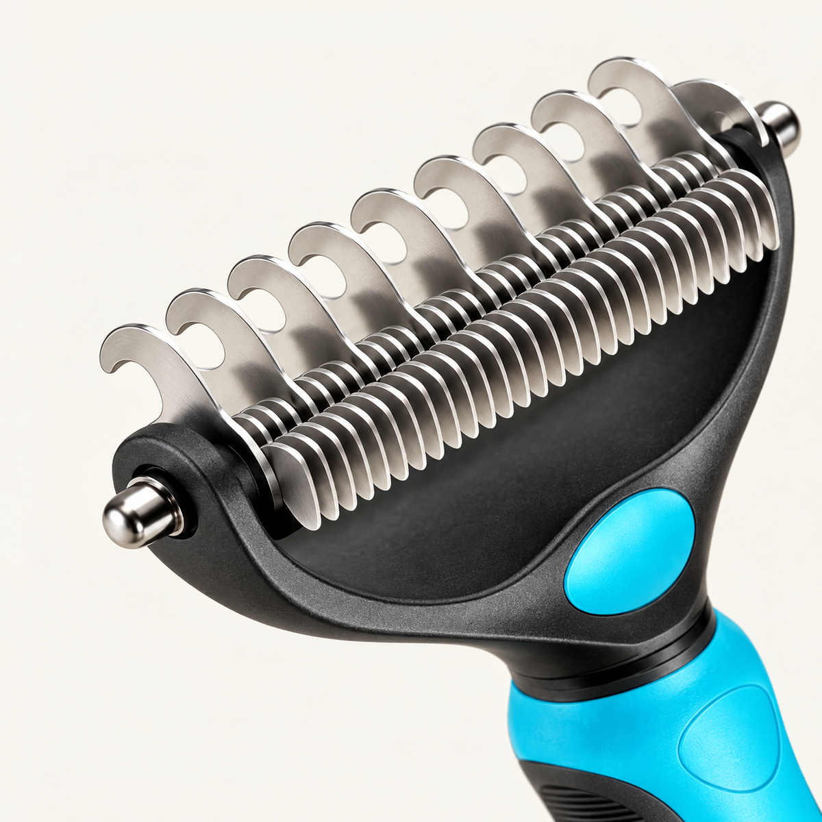 Close detail of the two rows of curved stainless steel blades, showing the fine-toothed side and the wide-toothed side