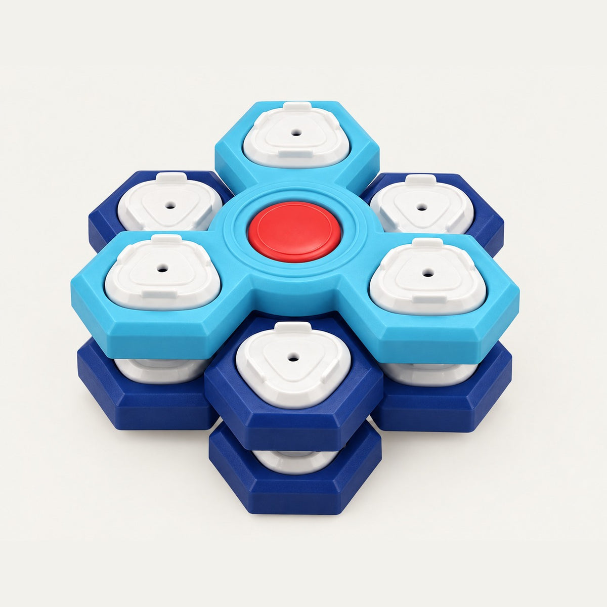 Two-tier flower-shaped pet treat puzzle: six navy hexagonal wells below, six light blue wells above, a red centre press button and twelve white removable lids