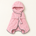 Blush pink plush microfibre dog drying robe with a hood, grey trim, a belt tie and four leg openings, laid flat