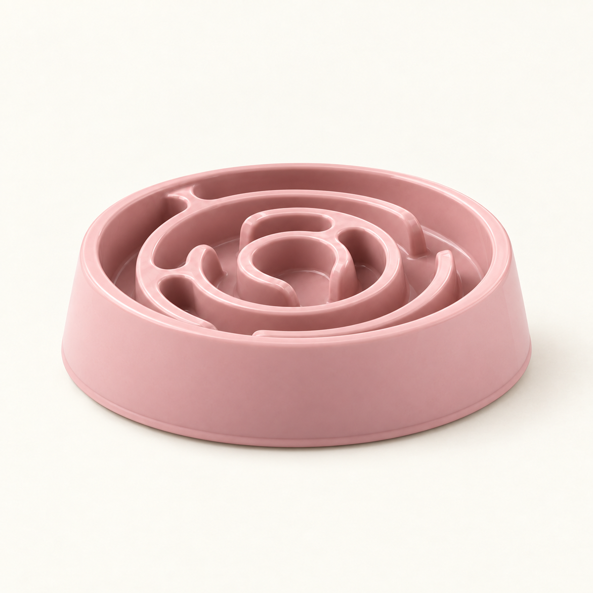 the slow feeder bowl seen from a low side-on angle showing its depth and tapered base